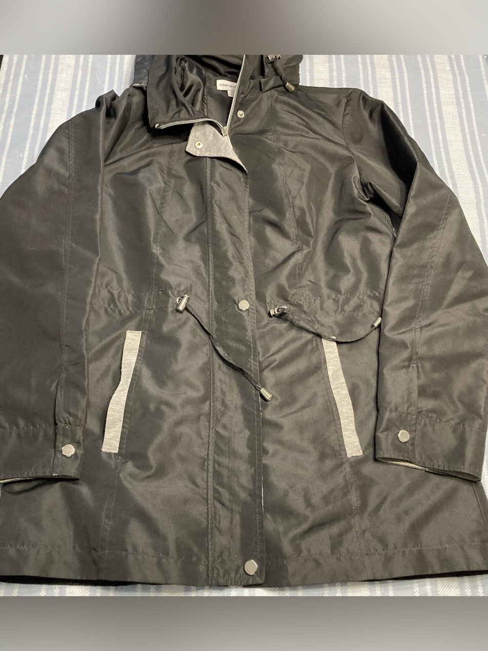 Susan Graver black hooded rain jacket.